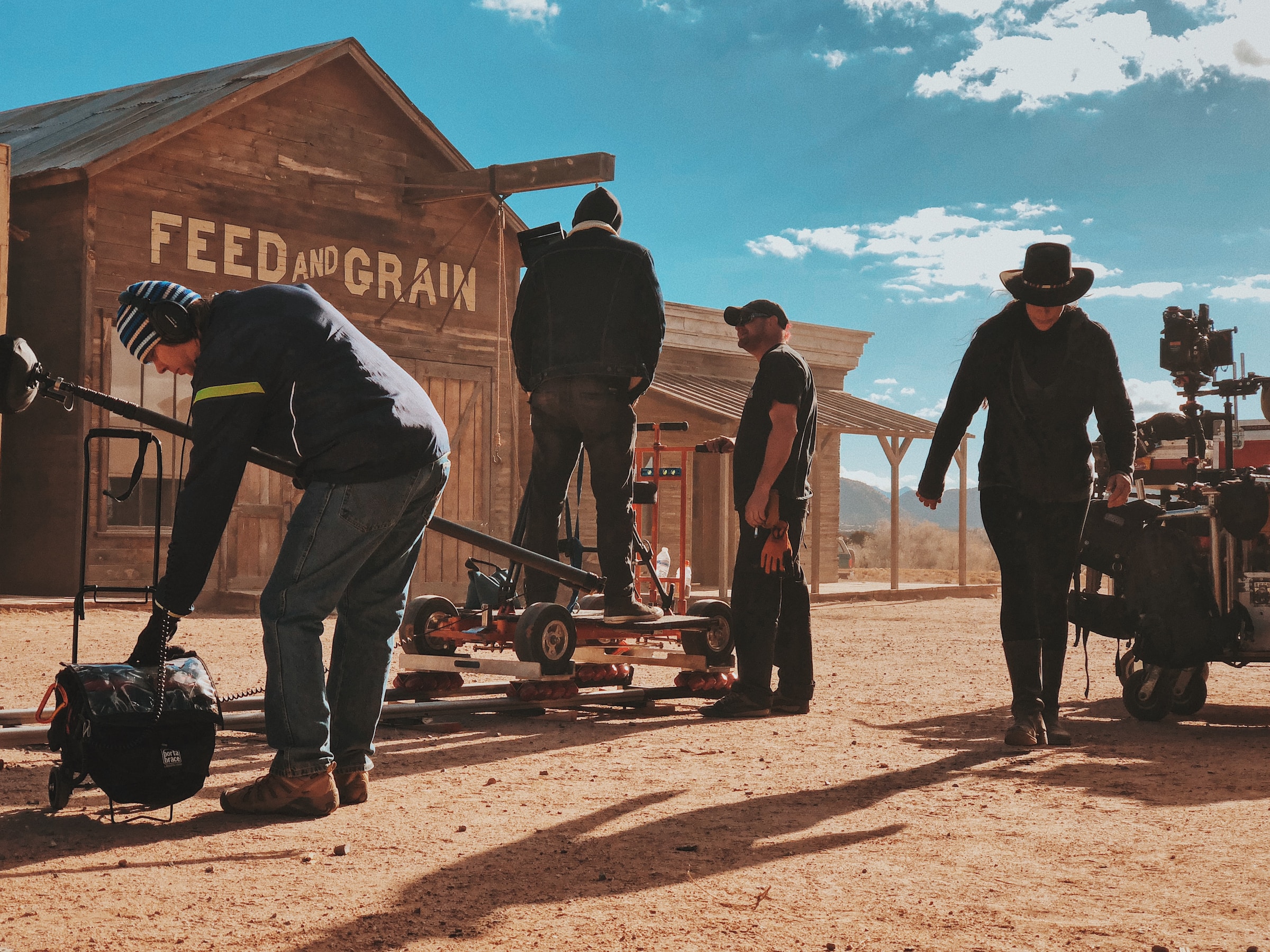 Crew working on a Western film set
