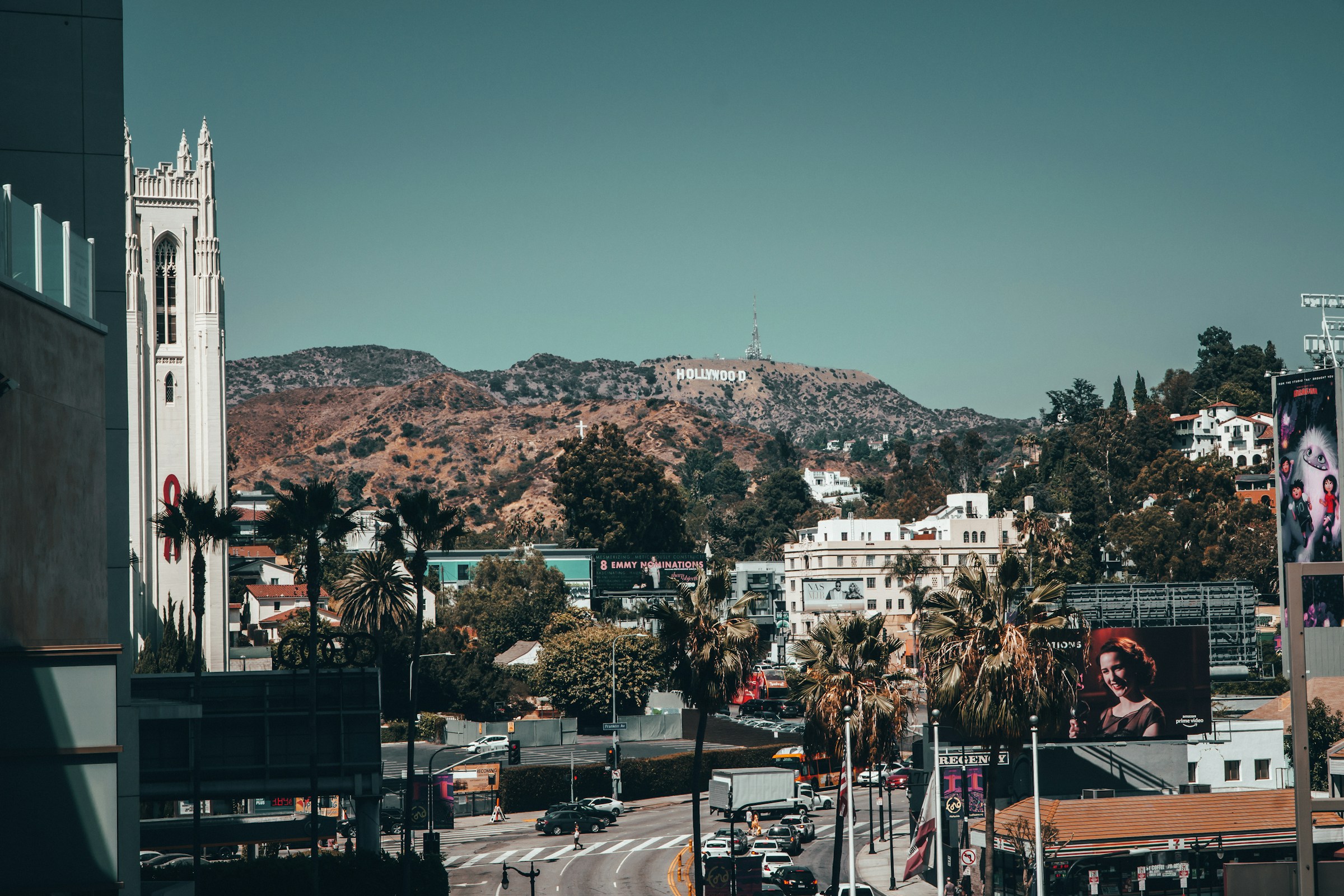 The streets of LA with the Hollywood sign in the distance