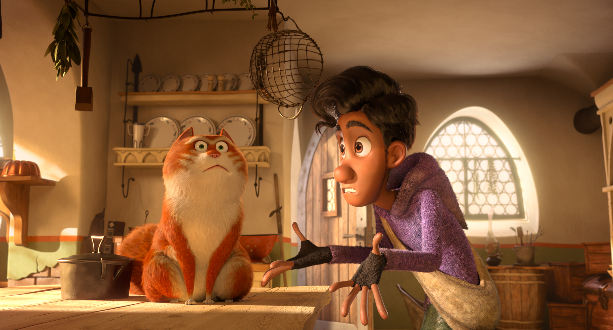 Maurice the cat sitting on a table looking startled next to Keith from 'The Amazing Maurice'