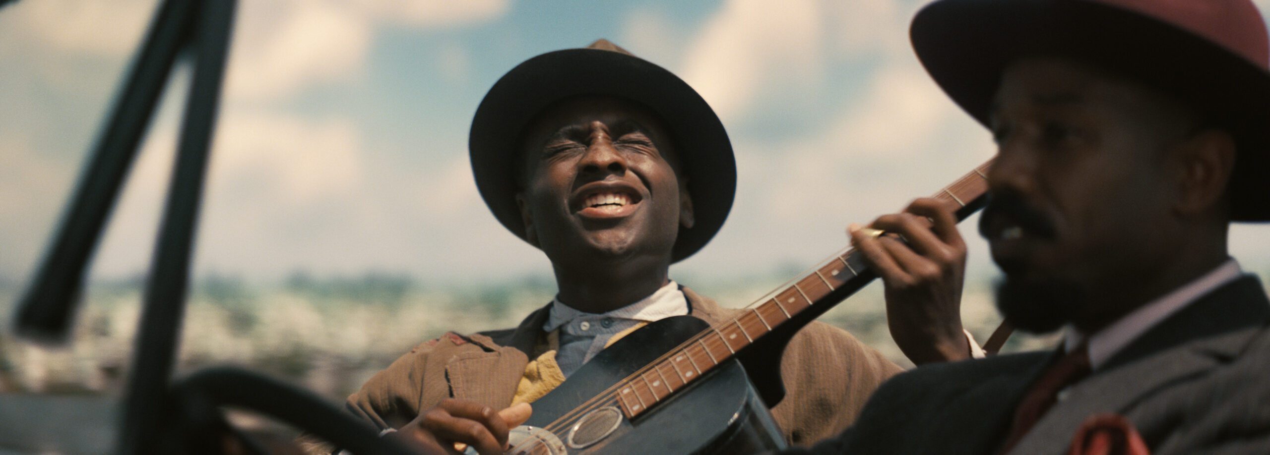 Miles Caton as Sammie Moore and Michael B. Jordan as Smoke in Warner Bros. Pictures’ Sinners