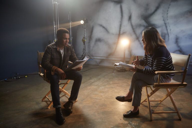 Actor reading a script during an audition