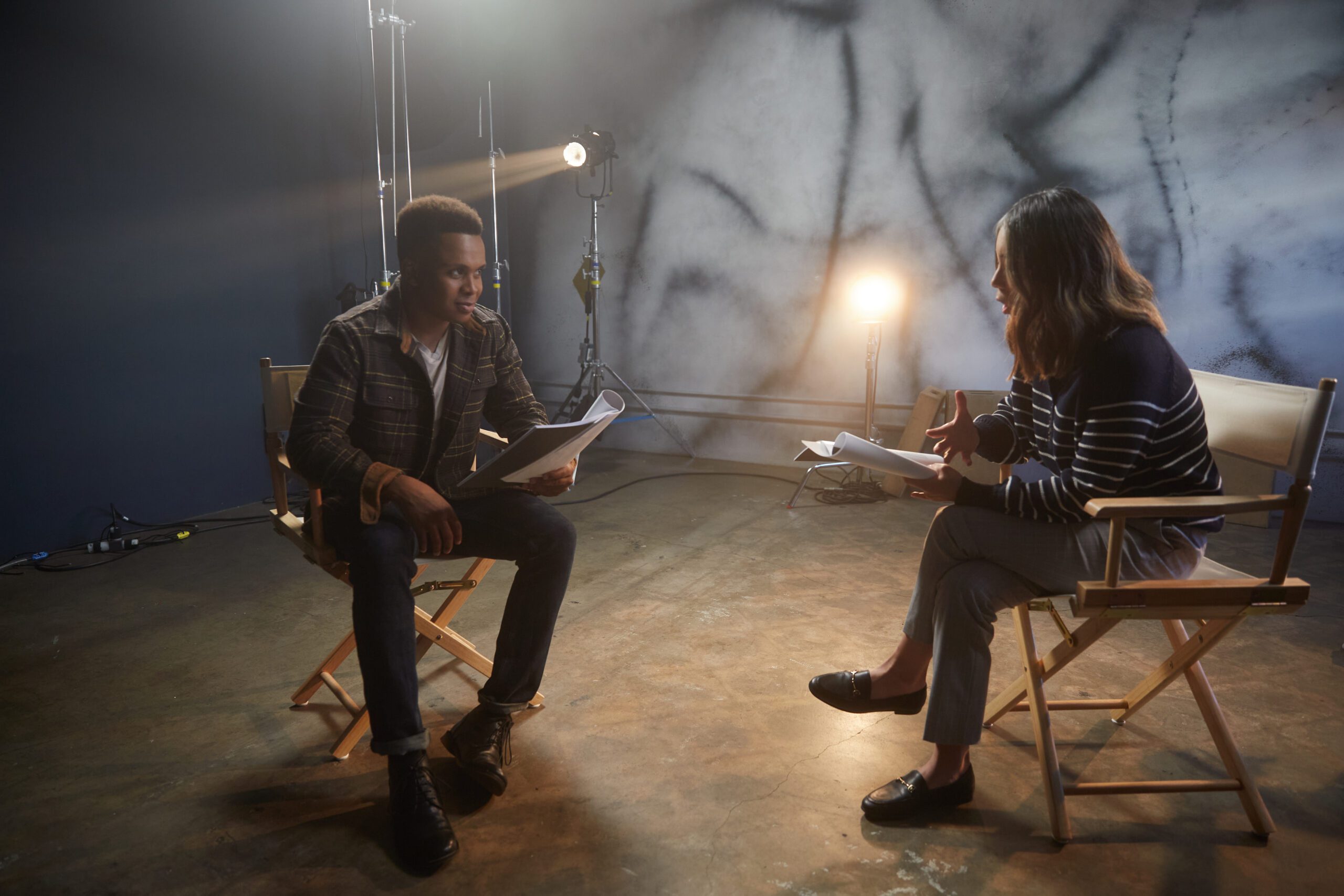 Actor reading a script during an audition