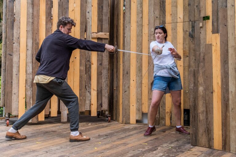 Actors at a fight rehearsal at Trebah Garden Amphitheatre in Cornwall