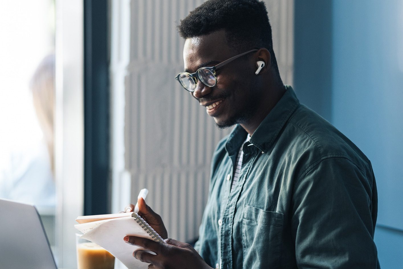 A black man reading a script